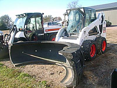 SnowDozer B.A.T. – Mining Tire Turned Snowplow